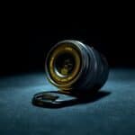 black camera lens on black textile