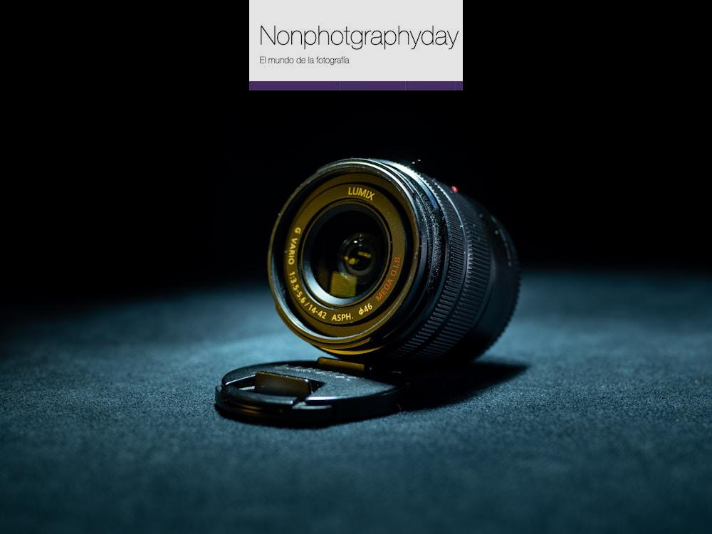 black camera lens on black textile