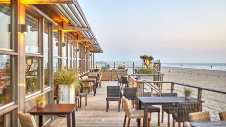 brown wooden tables with chairs on hardwood flooring